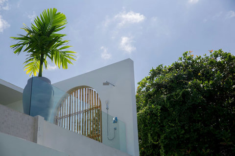 Cozy outdoor seating with designer pillows at C Villa luxury rental in Plai Laem, Koh Samui