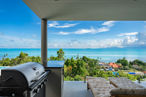Grill with a view – the balcony BBQ comes with sweeping sea views.