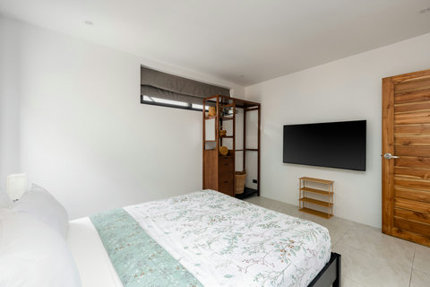 Comfort meets convenience – a cozy bedroom with direct access to your private ensuite for ultimate relaxation.