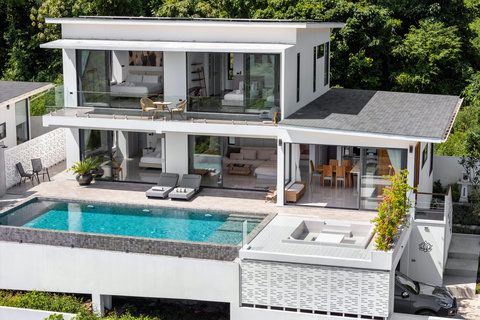 Poolside loungers with Samui sea views at Villa Maya - 3BR Chaweng Noi luxury vacation rental