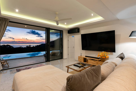 Villa Maya at twilight with illuminated pool - 3BR Chaweng Noi luxury villa with sea views Samui