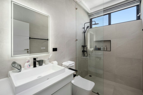 Sleek modern bathroom with large mirror at Villa Maya - 3BR sea view Chaweng Noi villa Koh Samui