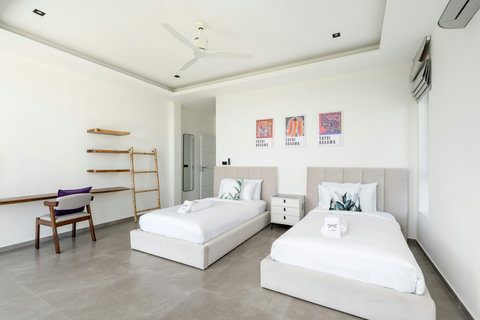 Master bedroom with private balcony and sea views at Villa Maya - 3BR Chaweng Noi Koh Samui