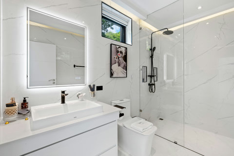 Luxury bathroom with freestanding tub and sea views at Villa Maya - 3BR Chaweng Noi Koh Samui