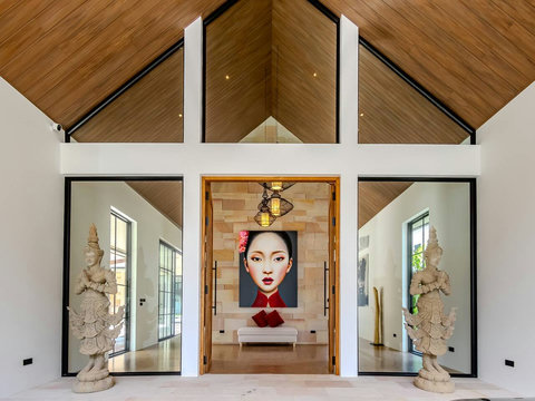 Step through doors into a gallery-like entrance. Art and architecture welcome you to your private sanctuary.