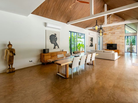 Slip into this peaceful room where wood tones and natural light create a warm retreat for restorative sleep.