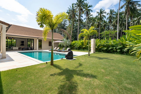 Palms tower above the turquoise water as you float, lounge, and soak up the island atmosphere all around you.