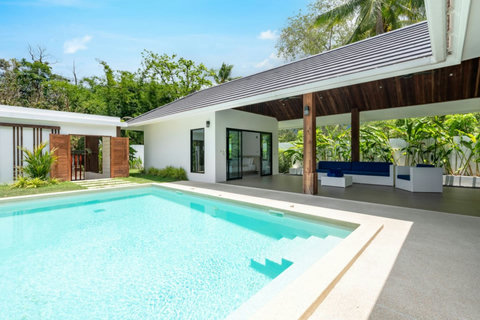 Shaded outdoor relaxation area with comfortable seating