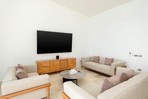Entertainment living room with large screen TV and sea views at Villa Gala, Koh Samui