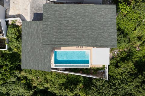 Aerial view of Villa Gala with infinity pool overlooking the ocean, Koh Samui Thailand