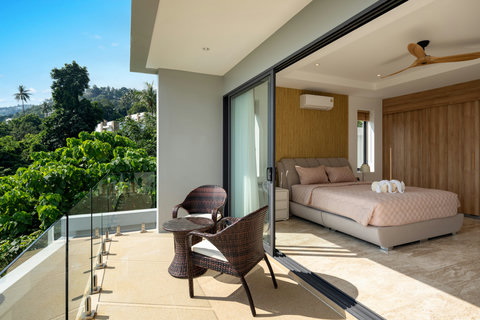 Pool terrace and lounge area with sea views at Villa Gala, luxury Koh Samui rental