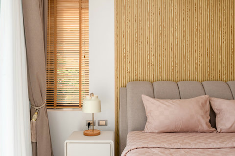Cozy bedroom with warm pink tones and sea view at Villa Gala, Koh Samui Thailand