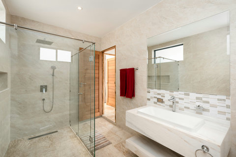 Bright ensuite with freestanding bathtub and glass shower at Villa Gala, Koh Samui