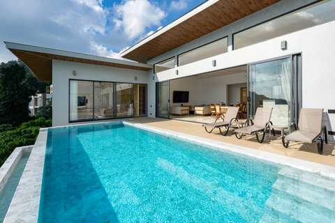 Private infinity pool with tropical garden and sea views at Villa Gala, Koh Samui