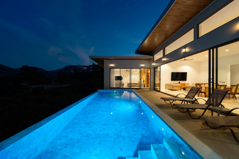 Evenings at Villa Gala — the infinity pool glows against Chaweng Noi’s hillside, creating a perfect tropical ambiance.