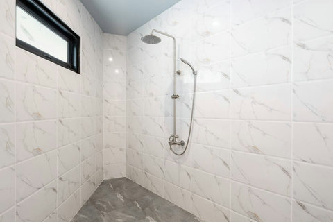 Stylish marble bathroom with rain shower at Villa SKY, Nathon Koh Samui