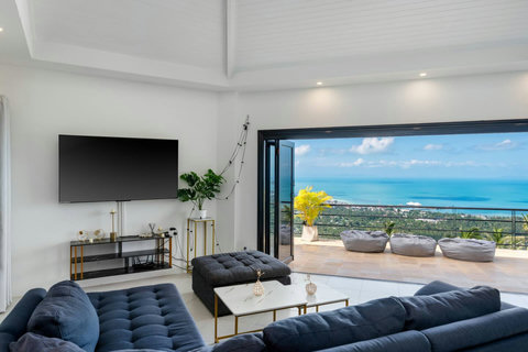 Spacious living room with ocean view and modern sofa at Villa SKY, Nathon Koh Samui