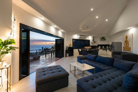Entertainment room with leather sofa and modern decor at Villa SKY, Nathon Koh Samui