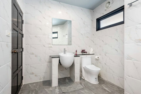 Modern bathroom with walk-in shower and contemporary fixtures at Villa SKY, Koh Samui