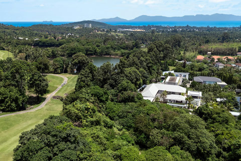 Breathtaking panoramic views of the golf course, ocean, and surrounding hills from the villa