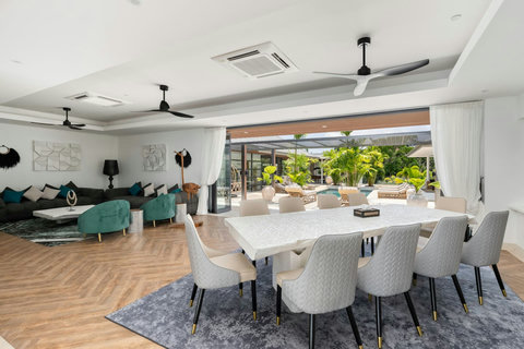 Elegant air-conditioned dining room with seating for the whole group and modern decor
