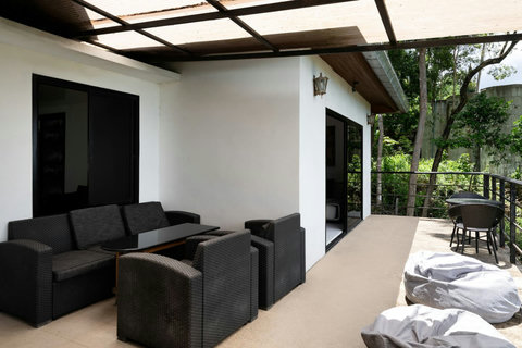 Modern lounge area with designer furnishings and ambient lighting at Moonview Paradise Village Koh Samui