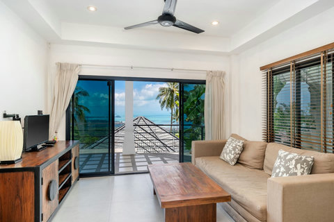 Stylish bedroom with seaview and modern furnishings at Sunview Paradise Village Koh Samui
