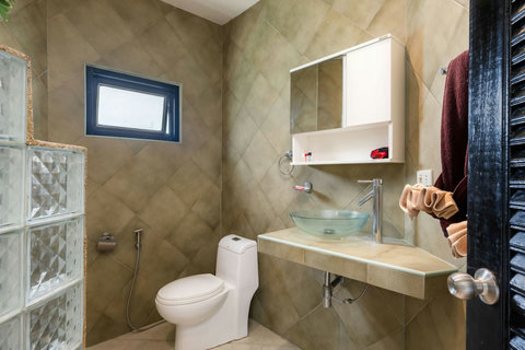 Clean modern bathroom with walk-in shower in Koh Samui seaview bungalow