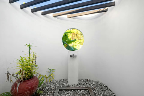 Indoor tropical garden courtyard at Sunhouse - nature-inspired Koh Samui villa at Paradise Village