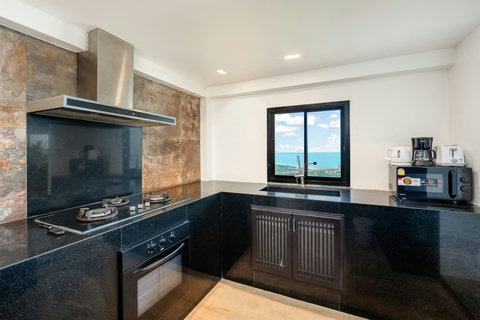 Elegant dark marble bathroom with dual vanity at Sunhouse - Koh Samui luxury villa Paradise Village