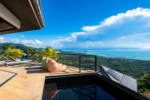 Lush tropical hillside setting with ocean views - Sunhouse villa at Paradise Village, Koh Samui Thailand