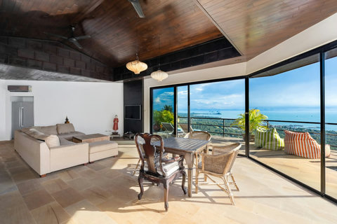 Open-plan living room with ocean view balcony at Sunhouse - Koh Samui hillside villa Paradise Village