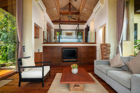 Spacious kitchen and dining area with wooden cabinetry and ocean view access - Villa Soluna 5-bedroom luxury hillside retreat southern Koh Samui