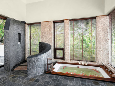 Luxurious stone bathtub with tropical garden views and natural light - Villa Soluna 5-bedroom hillside retreat southern Koh Samui