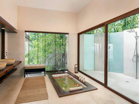 Spa bathroom with sunken tub and private garden atrium with natural light - Villa Soluna 5-bedroom luxury hillside retreat southern Koh Samui
