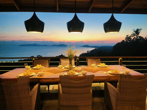 Outdoor dining terrace with spectacular sunset ocean views and pendant lighting - Villa Soluna 5-bedroom luxury hillside retreat southern Koh Samui