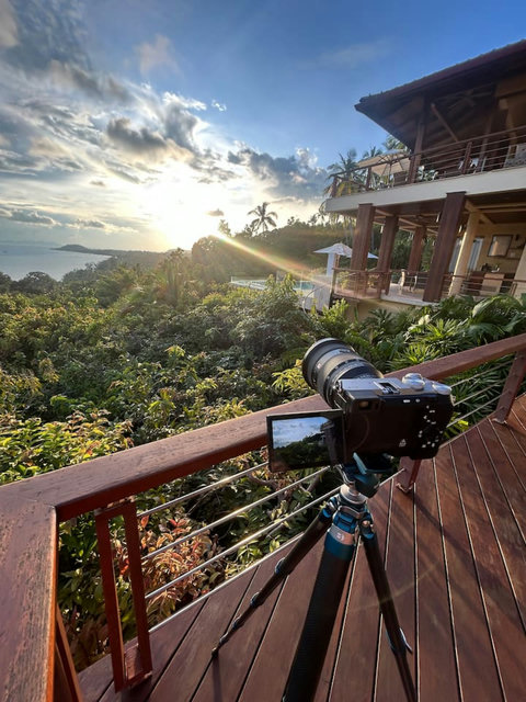 Camera capturing stunning sunset ocean views from terrace - Villa Soluna 5-bedroom luxury hillside retreat southern Koh Samui