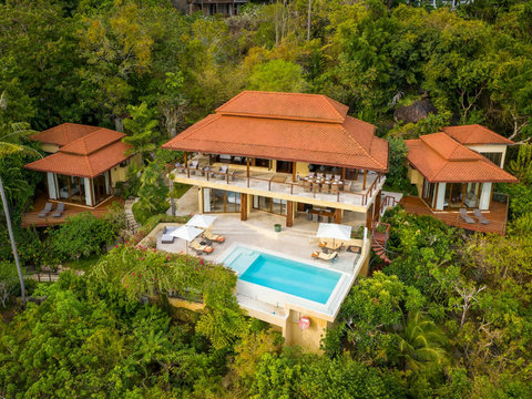 Aerial view of Villa Soluna with infinity pool, tropical jungle and ocean panorama - 5-bedroom luxury hillside escape southern Koh Samui