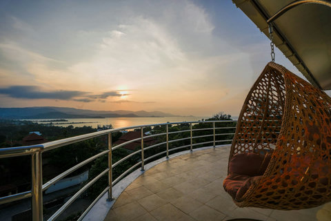 Curved balcony lounge with ocean views and blue cushions