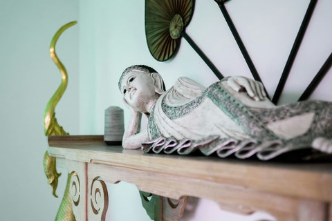 Artistic bedroom with decorative wallpaper and ornate details