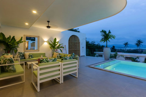 Rooftop terrace with sea views and white lounge furniture at C Villa, Koh Samui Thailand holiday rental