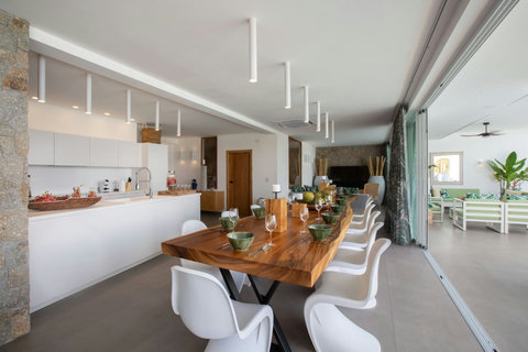 Fully equipped modern kitchen with garden-view breakfast bar at C Villa, Koh Samui luxury rental property