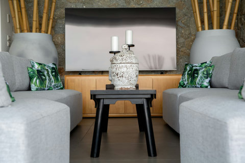 Stylish living area with contemporary tropical design and comfortable seating at C Villa, Koh Samui rental