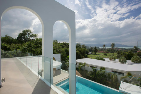 Panoramic hilltop and ocean views from the pool terrace at C Villa, Koh Samui luxury vacation estate