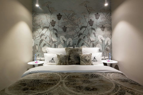 Serene bedroom with botanical wall mural and designer lighting at C Villa, Koh Samui Thailand rental