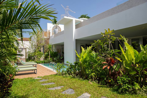 Aerial view of C Villa grounds showcasing the pool and tropical garden setting in Koh Samui, Thailand