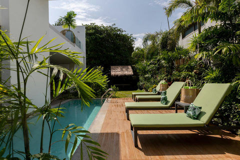 Tropical garden terrace with ocean and hillside views at C Villa, private holiday rental in Koh Samui