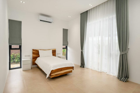 Serene bedroom with garden views Mark villa Marlow Koh Samui