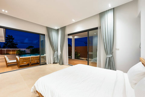 Master bedroom with evening pool views Mark villa Marlow Koh Samui