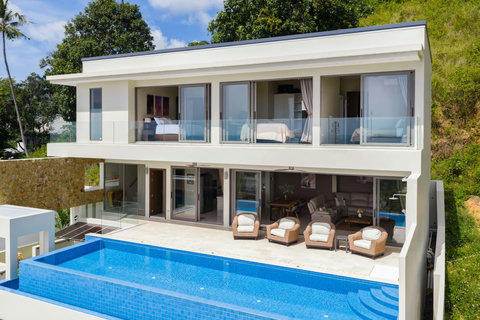 Seamless indoor-outdoor living with panoramic views, infinity pool, and a stylish open-plan lounge